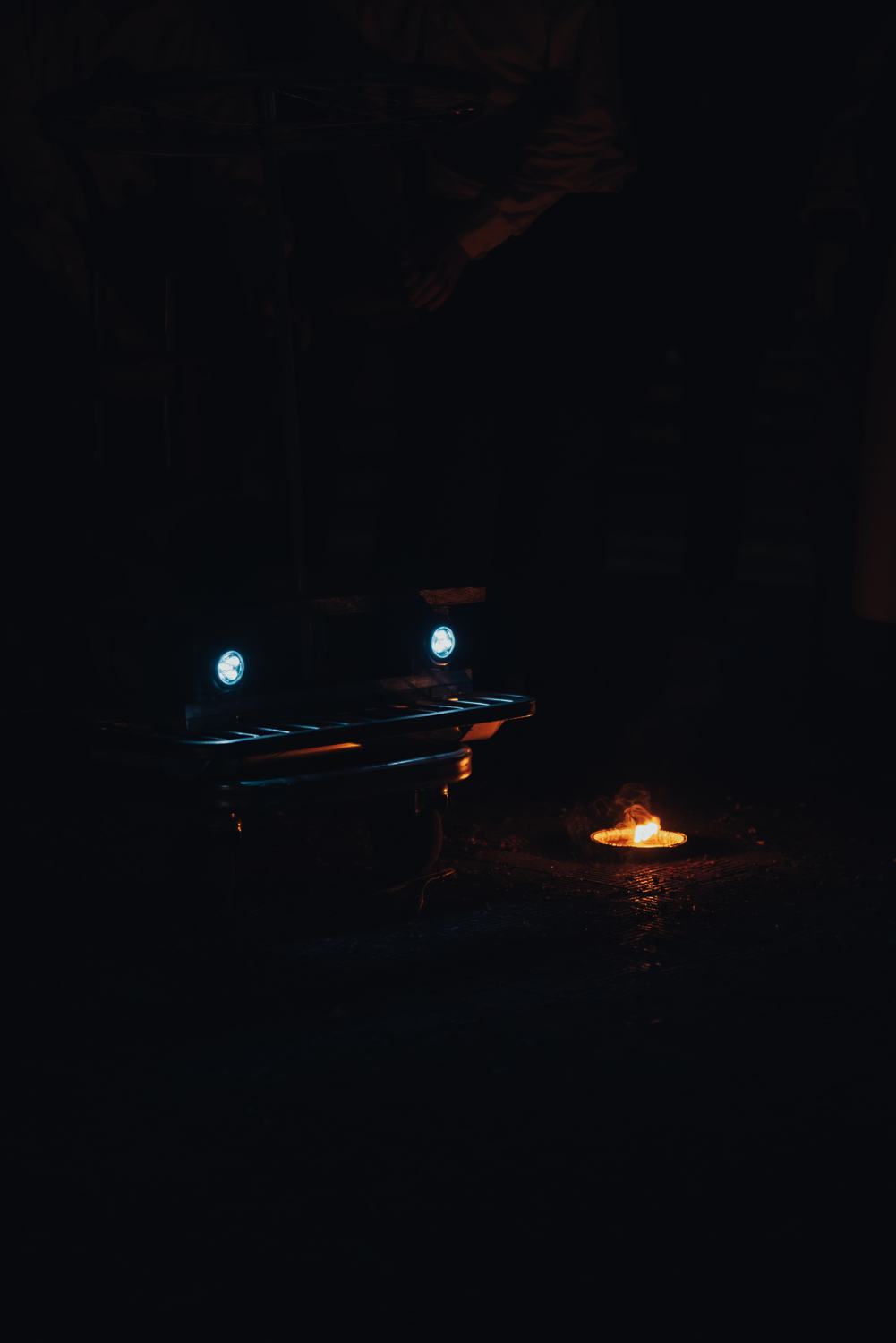 The cart, with its headlights and a candle The cart, with its headlights and a candle