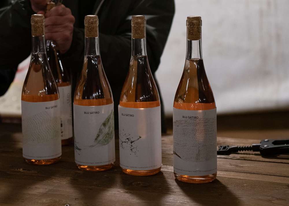 Four bottles, four different labels Four bottles, four different labels