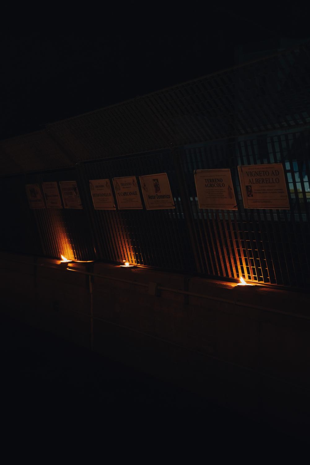 The notices at night, lit by candles The notices at night, lit by candles