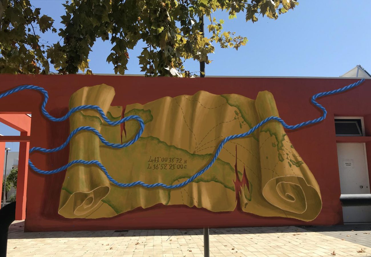 Piazza Trieste, Adelfia: a map as a scroll, tied with a blue rope